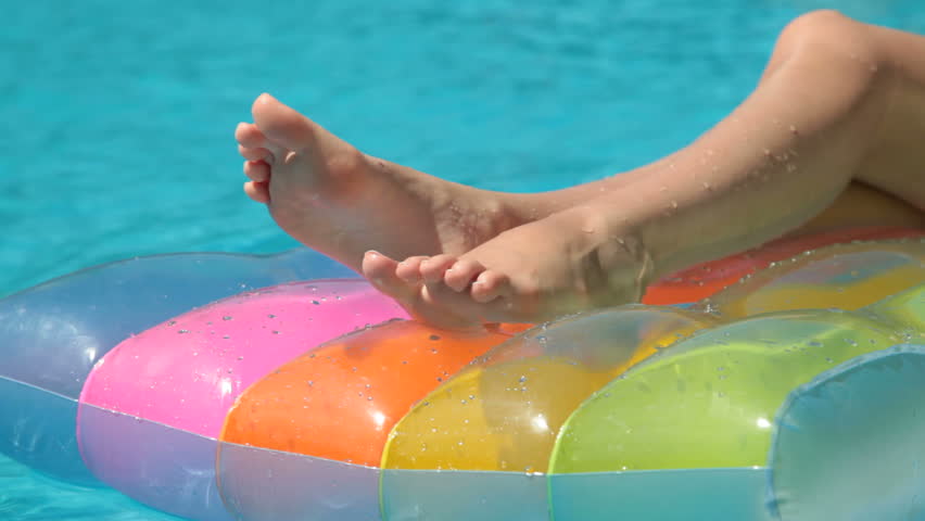 girl on pool float