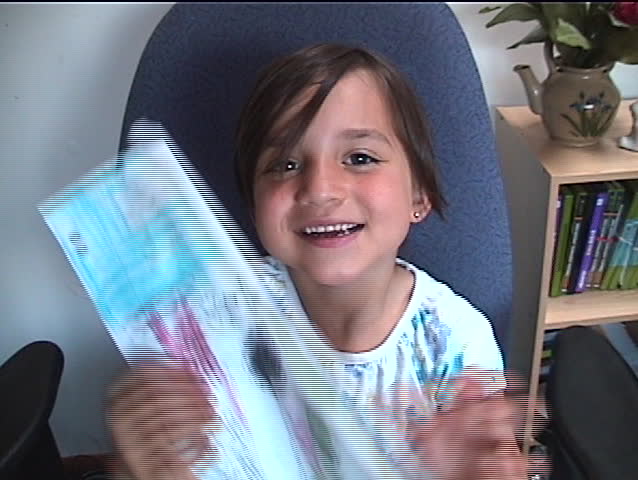 Little Girl Shows Viewer A Picture Over A Webcam. Stockvideos ...