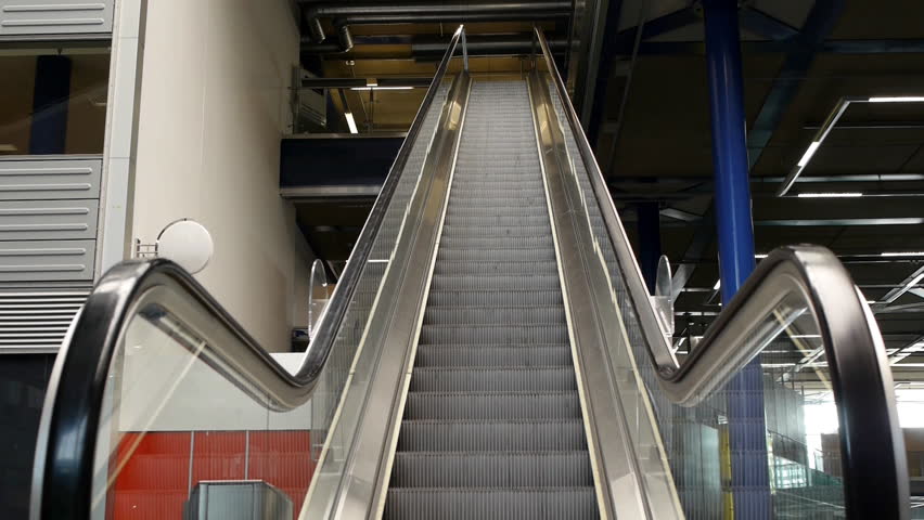 Escalator. An Escalator Going Up With No People On It. Stock Footage 