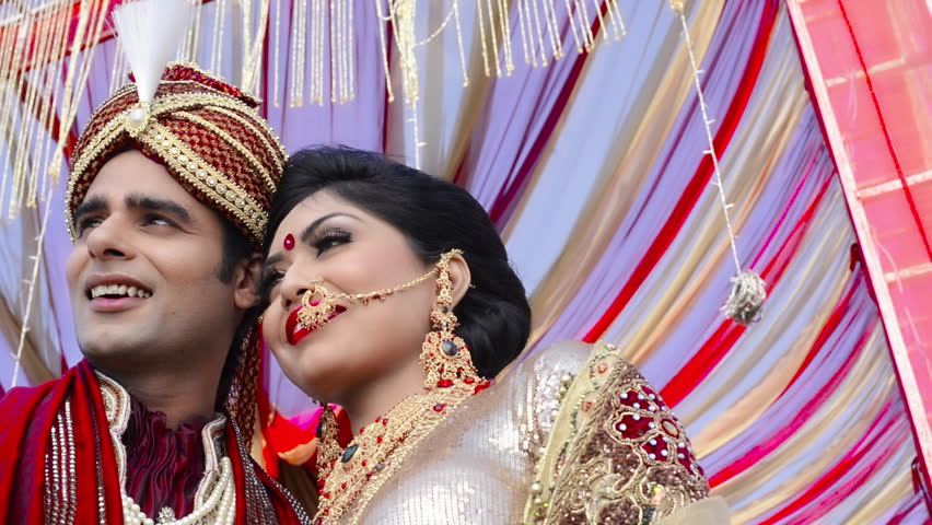 Shot Of Indian Bride And Groom In Traditional Wedding Dress Posing 