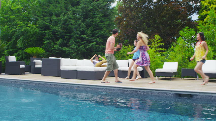 Group Of People Running In To Next Pool Stock Footage