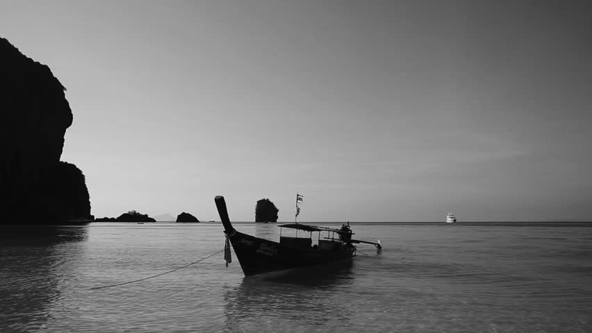 rock the boat definition longtail boat arriving to a paradise beach with an rock the boat definition longtail boat arriving to a paradise beach with an