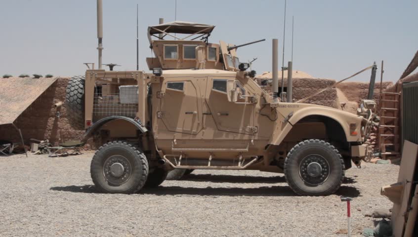 Afghanistan, Circa 2011: Pan Shot Of A Us Marine Mrap Stock Footage 