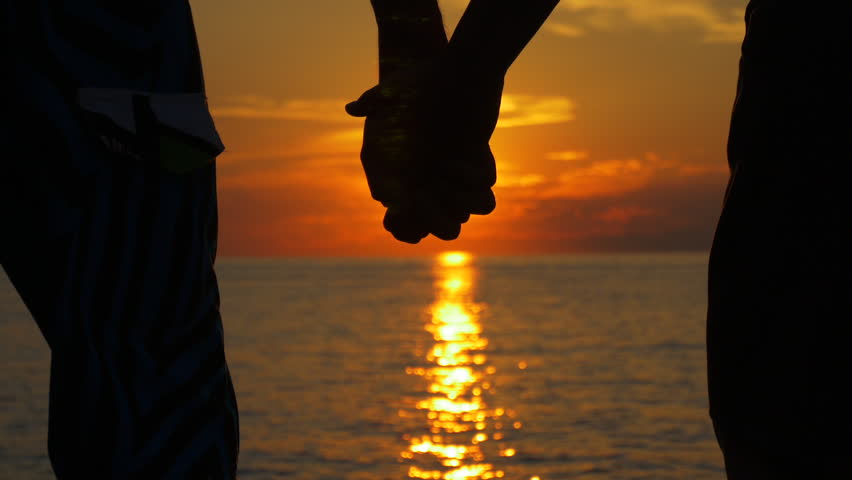 Couple Holding Hand At Ocean Sunset Stock Footage Video 6970234