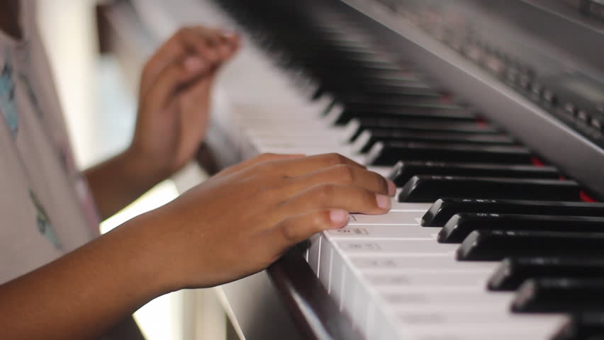 A Child's Hand Playing The Piano Stock Footage Video 11306840 ...