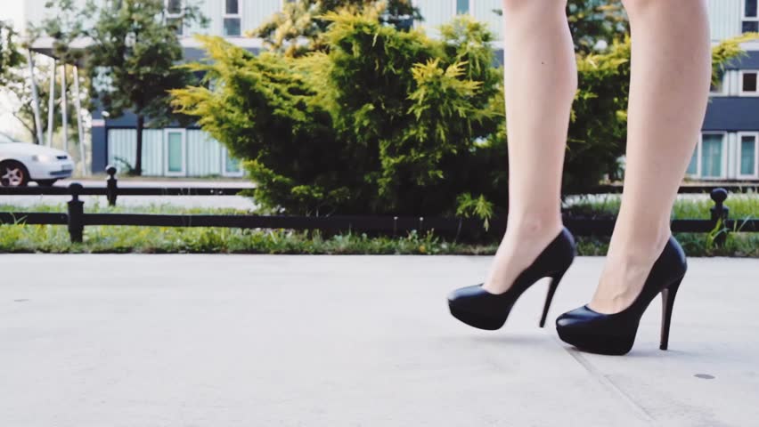Sexy Woman Legs In Black High Heels Shoes Walking In The City Urban ...