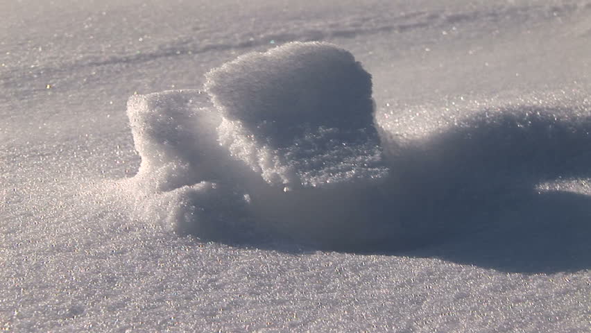 Ground shot of snow blowing - HD stock footage clip