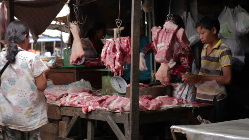 Butcher Selling Fresh Meat In Local Asian Market, Unhygienic Food ...