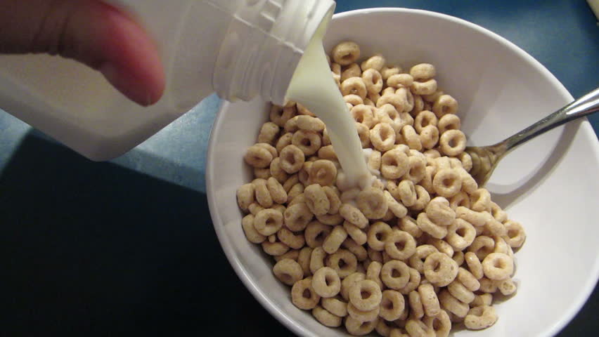 Milk Being Poured Onto Cereal. Stock Footage Video 3705008 - Shutterstock