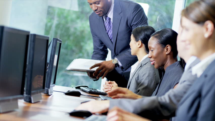 Male African American Sales Manager Giving Multi Ethnic Team Latest ...