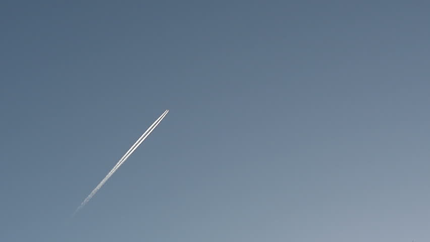 Distant Plain Leaving A Contrail In The Sky. Stock Footage Video ...