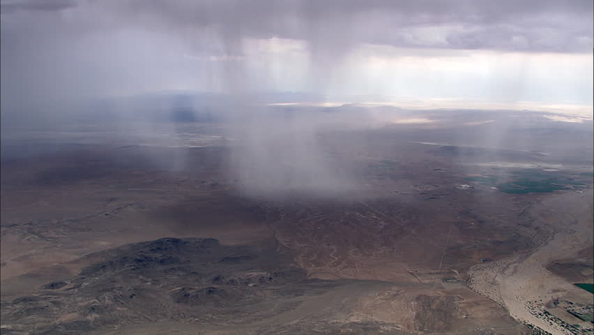 Rain Clouds Desert Plateau. Aerial Shot From Helicopter An Isolated ...