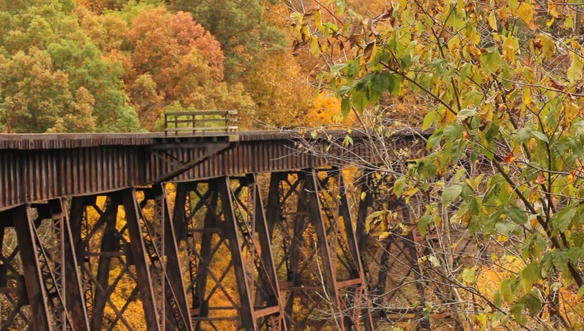 Railroad Bridge With Beautiful Fall Trees And Colors Stock Footage ...