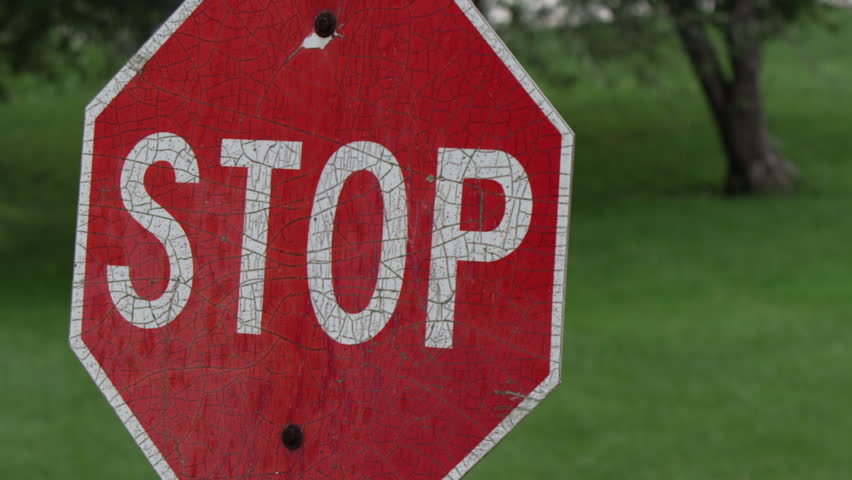 Closeup Of A Car Driving Past A Stop Sign. Stock Footage Video 7084438 ...